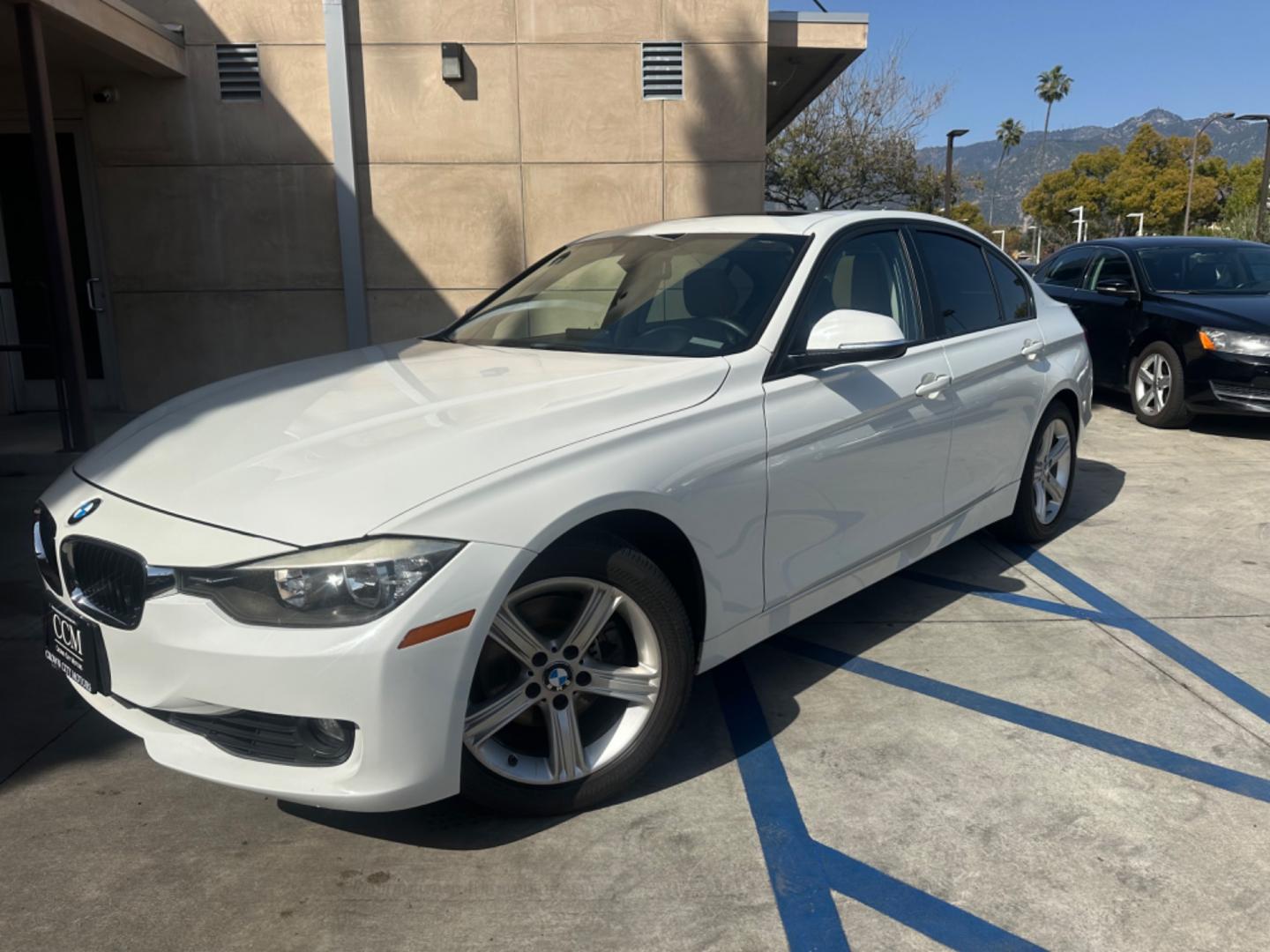 2013 White /Tan BMW 3-Series Leather (WBA3C3C56DF) with an 4 Cylinder engine, Automatic transmission, located at 30 S. Berkeley Avenue, Pasadena, CA, 91107, (626) 248-7567, 34.145447, -118.109398 - Low Miles! Leather seats! ntroducing the 2013 BMW 3-Series 320i Sedan, a timeless blend of luxury, performance, and style. With its sleek design and impressive features, this vehicle is sure to turn heads on the road. And with only 88,248 miles on the odometer, it's a low-mileage gem, especially f - Photo#0